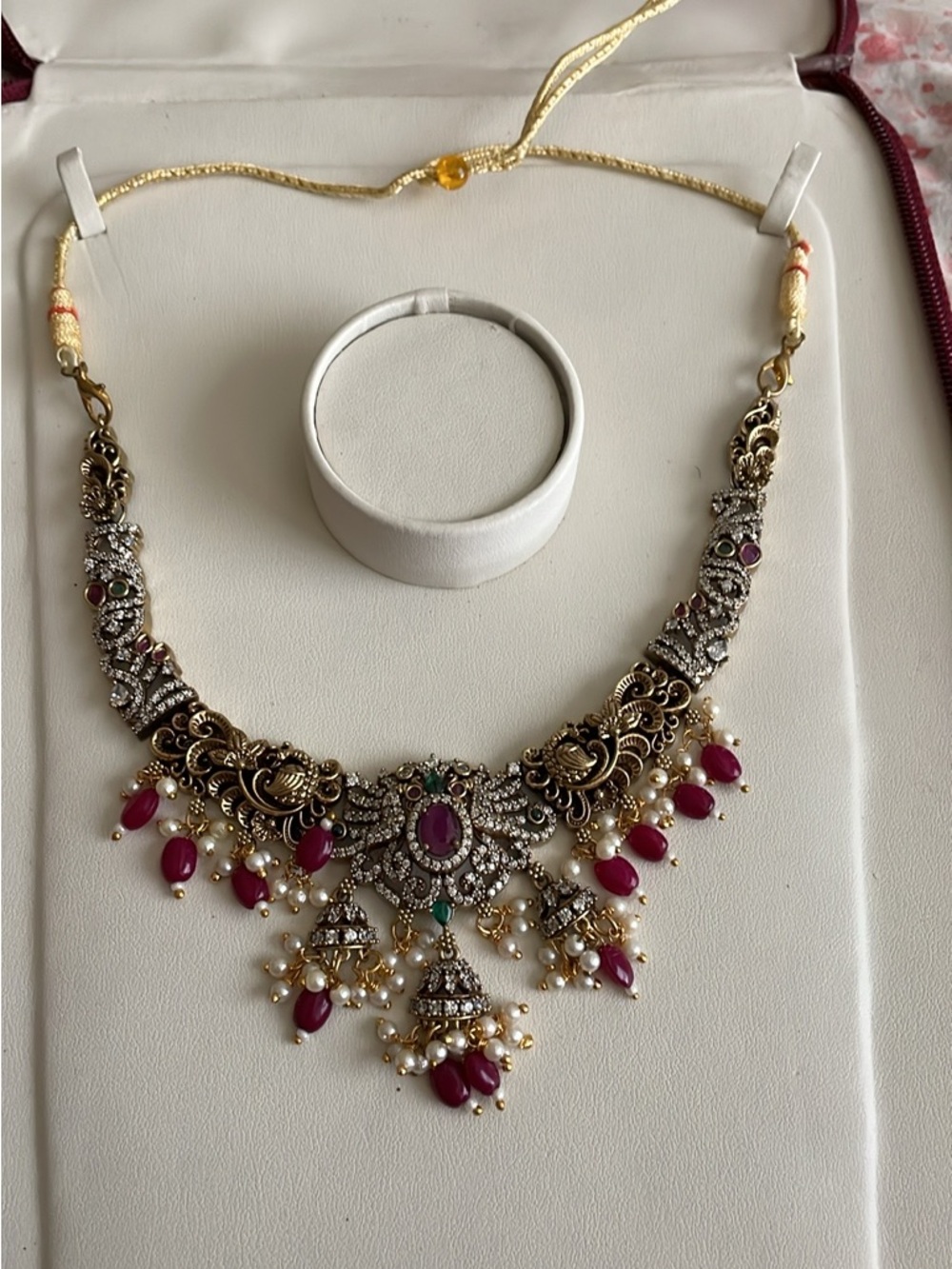 Elegant Gold-Tone Necklace with Pink Gem Accents